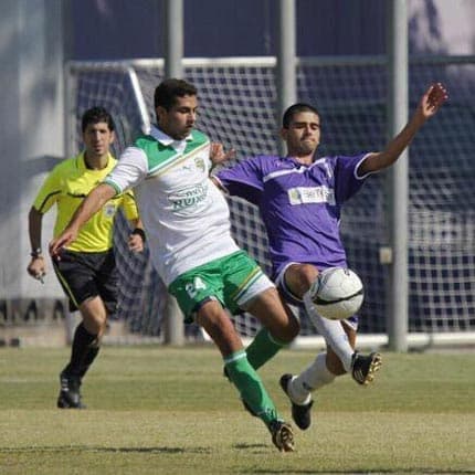 Sahar playing soccer